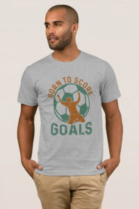 Man wearing t-shirt with Born to Score Goals written on the front